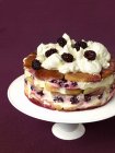 Closeup view of blackberry and apple trifle on cake stand — Stock Photo