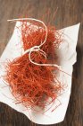 Saffron threads tied in bunch — Stock Photo