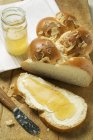 Bread with butter and honey — Stock Photo