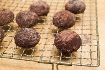 Hazelnut biscuits on cake rack — Stock Photo
