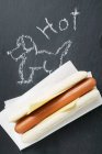 Hot dog with drawing — Stock Photo