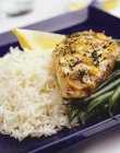 Lemon and thyme chicken with rice — Stock Photo