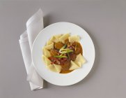 Beef with pasta sheets — Stock Photo