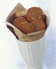 Nut biscuits in glass cup — Stock Photo