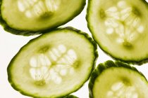 Cucumber slices with backlit — Stock Photo