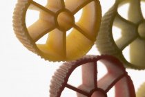 Coloured pasta wheels — Stock Photo