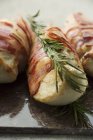 Chicken breasts wrapped in bacon — Stock Photo