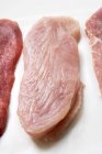 Rohes Schweinefleisch mit Puten- und Kalbsschnitzeln — Stockfoto