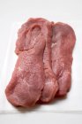 Three veal escalopes — Stock Photo