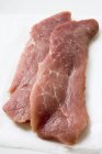 Raw pork escalopes — Stock Photo