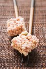Rice sweets on spoon — Stock Photo