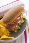 Sub sandwich with crisps — Stock Photo