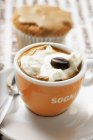 Cup of espresso with whipped cream — Stock Photo