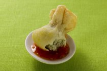 Closeup view of Wonton with sweet and sour sauce — Stock Photo