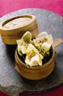 Elevated view of Wontons in bamboo steamer — Stock Photo