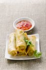 Spring rolls with chili dip — Stock Photo