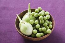 Green baby aubergines — Stock Photo