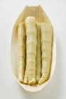 Bamboo shoots in wooden bowl — Stock Photo