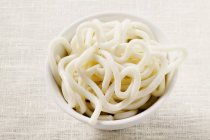 Udon noodles in white bowl — Stock Photo