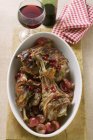 Braised lamb with cranberries — Stock Photo