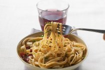 Spaghetti with dried peppers — Stock Photo