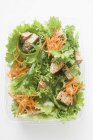 Salad leaves with carrots — Stock Photo