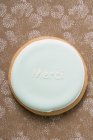 Biscoito de cor pastel com palavra Merci — Fotografia de Stock