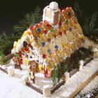 Lebkuchenhaus und Süßigkeiten — Stockfoto