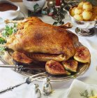 Roast goose with figs — Stock Photo