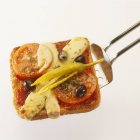 Tomato and cheese on toast — Stock Photo