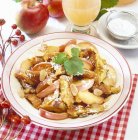Closeup view of Kaiserschmarrn with stewed apple — Stock Photo