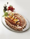 Sausage and ham platter — Stock Photo