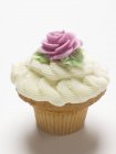 Richly decorated cupcake — Stock Photo