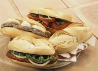 Elevated view of Bocadillos baguette rolls with various fillings — Stock Photo