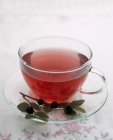 Cup of blueberry tea — Stock Photo