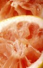 Pink squeezed grapefruit — Stock Photo