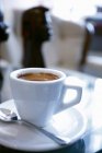 Copa de café espresso caliente - foto de stock