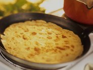 Pancake in a frying pan — Stock Photo