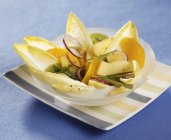 Chicory salad with fruit — Stock Photo