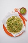Pasta with pesto and beans — Stock Photo