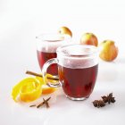 Mulled wine in glass mugs — Stock Photo