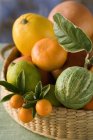 Basket of assorted citrus fruits — Stock Photo