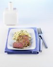 Loin of lamb in olive crust with bulgur — Stock Photo