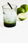 Mineral water with limes — Stock Photo
