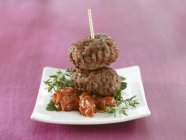 Two meatballs on tomato — Stock Photo
