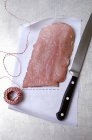 Veal escalope with string — Stock Photo