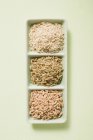 Spelt, unripe spelt and brown rice — Stock Photo