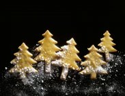 Pastry Christmas trees with pearl sugar — Stock Photo