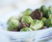 Brussels sprouts with chestnuts — Stock Photo