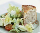 Pork pie with fresh salad — Stock Photo